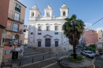 a close up of a street in front of a building