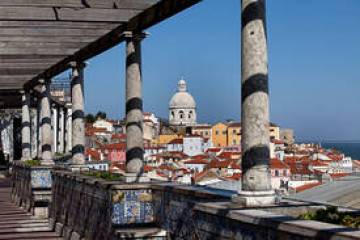 a wooden dock in front of a building