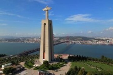 a view of a large body of water with a city in the background